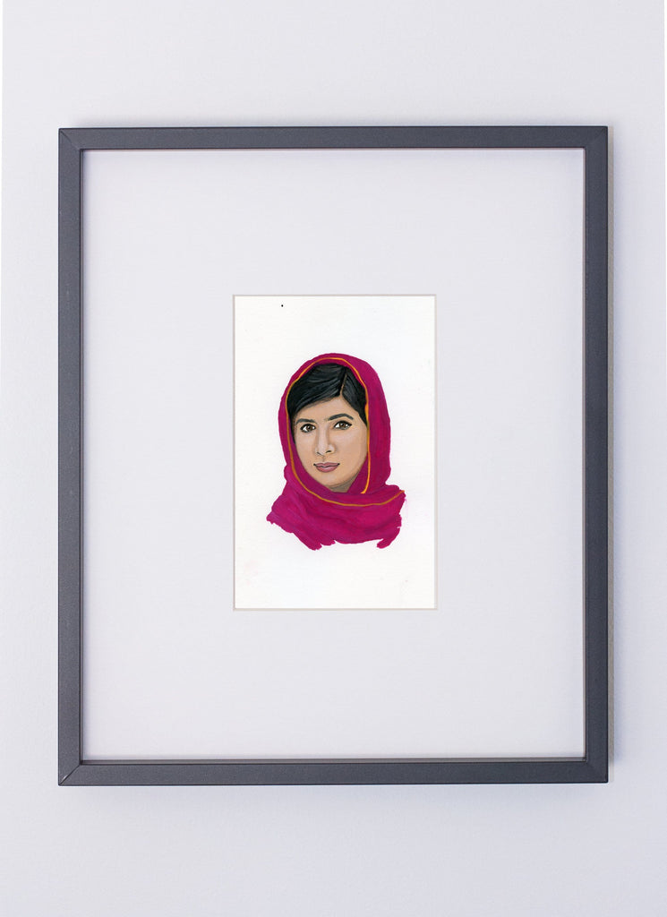 Malala Yousafzai portrait in gouache by Liz Langley framed in black frame
