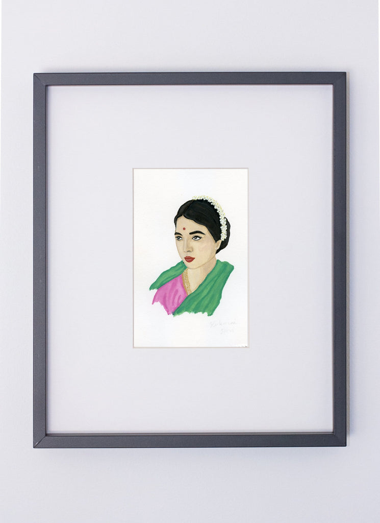 Rukmini Devi portrait in gouache by Liz Langley framed in black frame