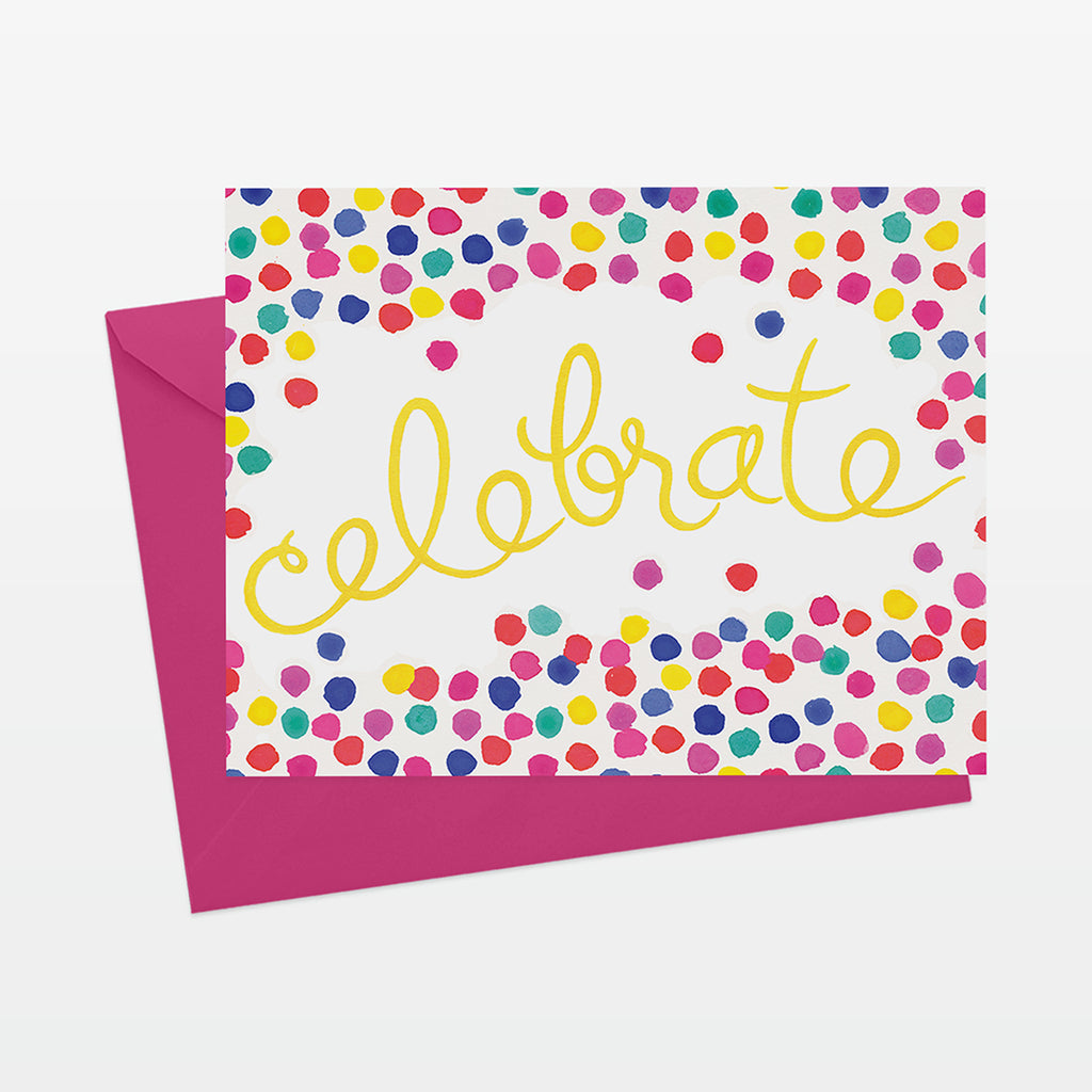 A2 celebration greeting card reads celebrate in hand-painted script surrounded by brightly colored painted confetti dots on top of bright pink envelope