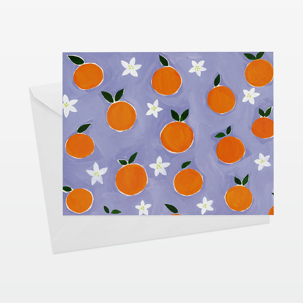 A2 Horizontal everyday card with oranges pattern on periwinkle ground. Shown with white envelope.