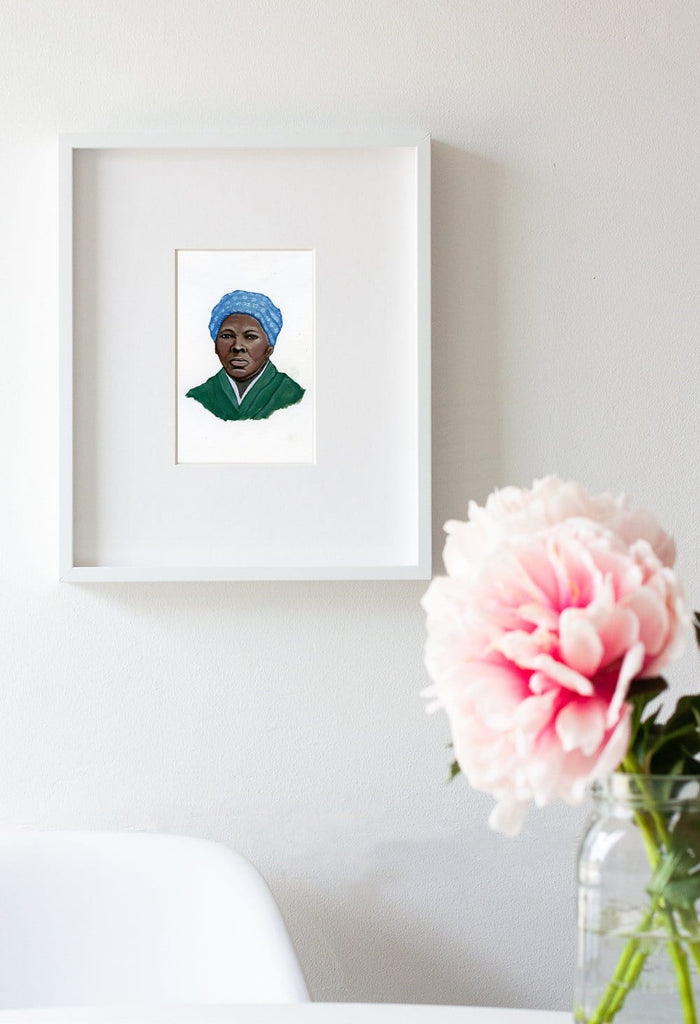 Harriet Tubman portrait in gouache by Liz Langley framed in white frame