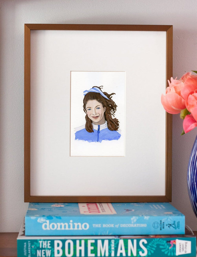 Kathrine Switzer portrait in gouache by Liz Langley framed in antique gold frame
