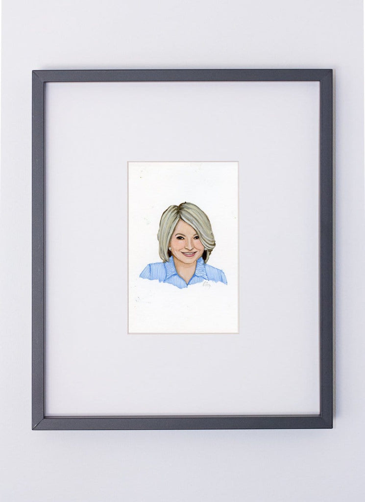 Martha Stewart portrait in gouache by Liz Langley framed in black frame