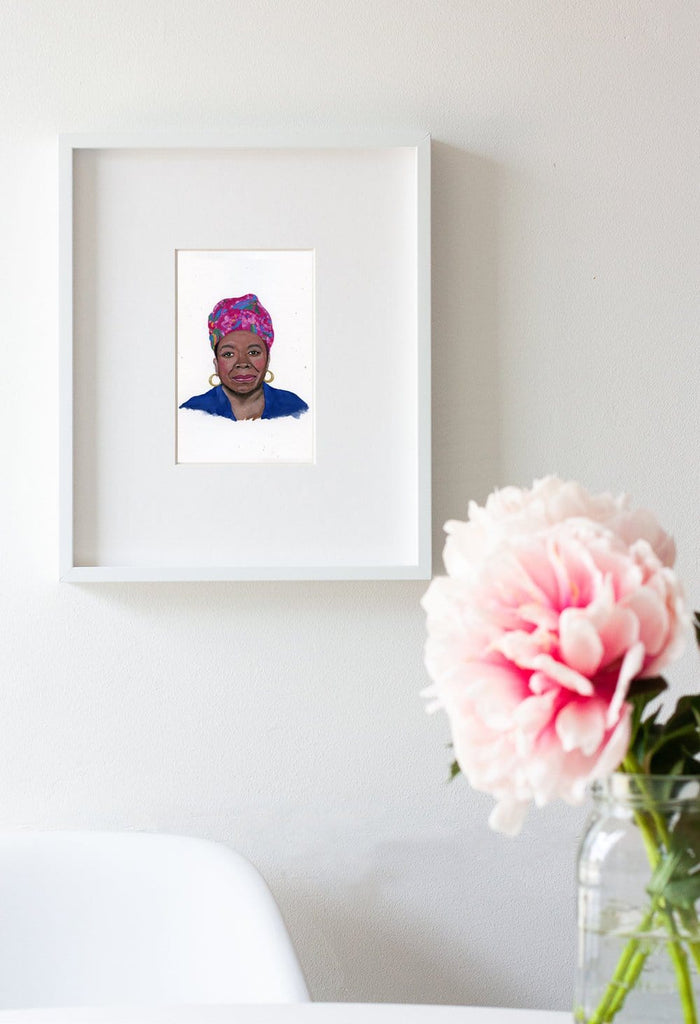 Maya Angelou portrait in gouache by Liz Langley framed in white frame