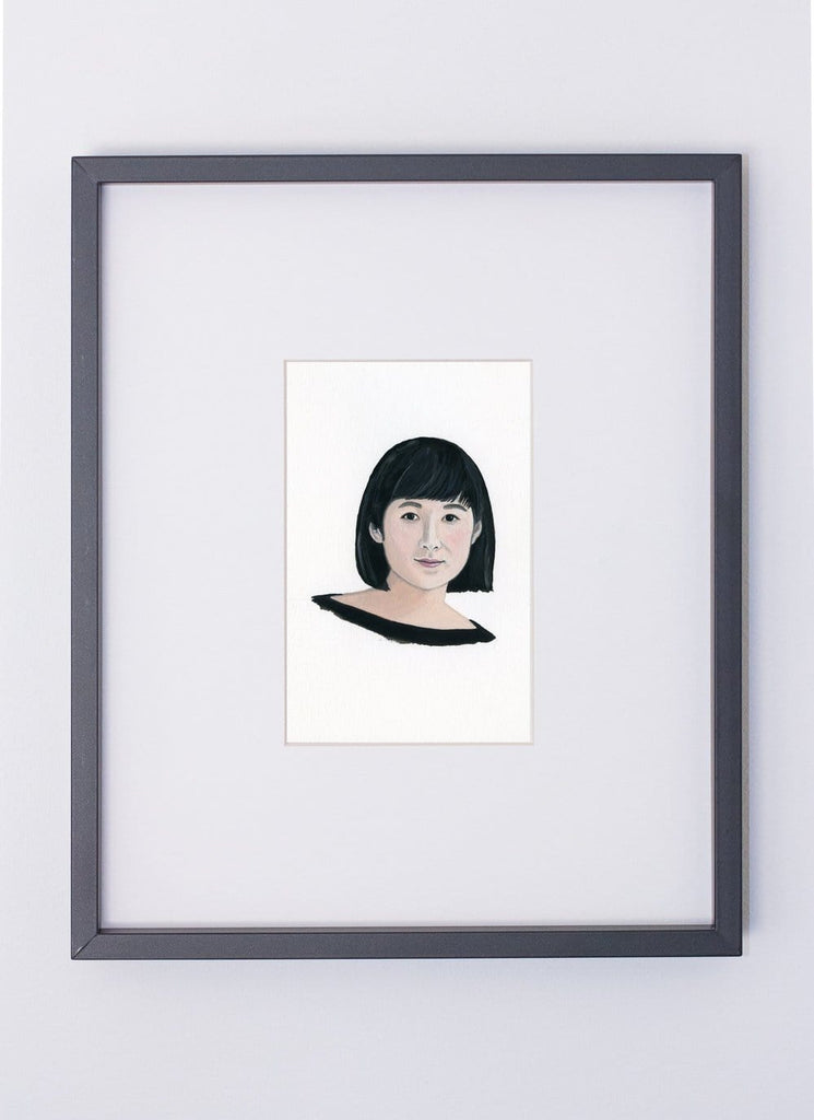 Maya Lin portrait in gouache by Liz Langley framed in black frame