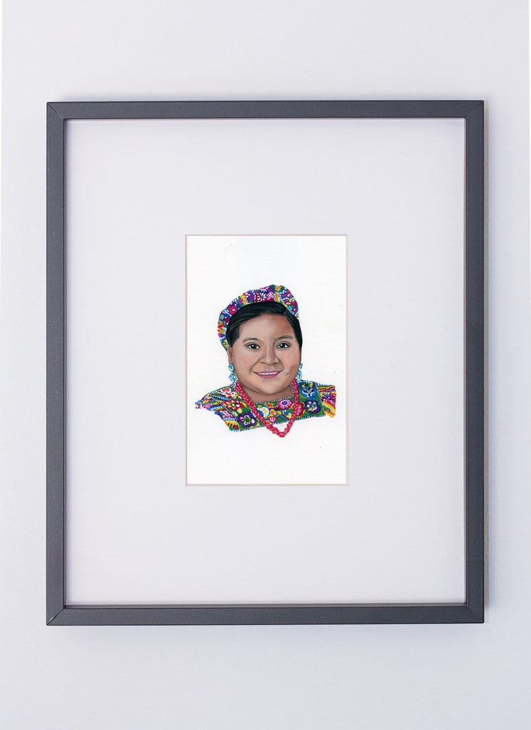 Rigoberta Menchú portrait in gouache by Liz Langley framed in black frame