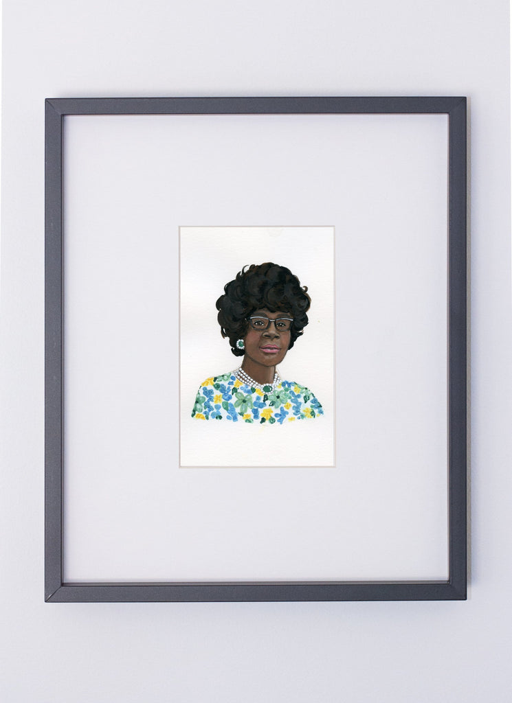 Shirley Chisholm portrait in gouache by Liz Langley framed in black frame